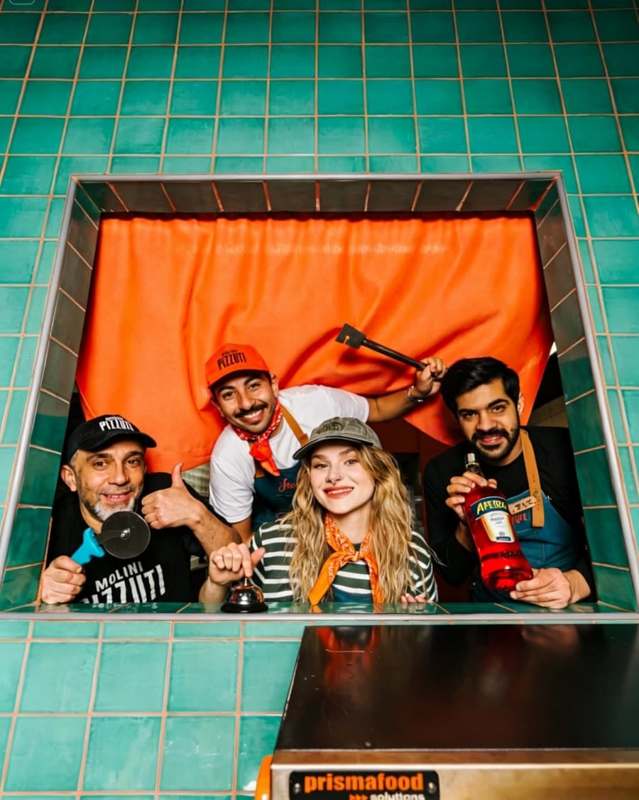Friends posing in the Steezza photobooth