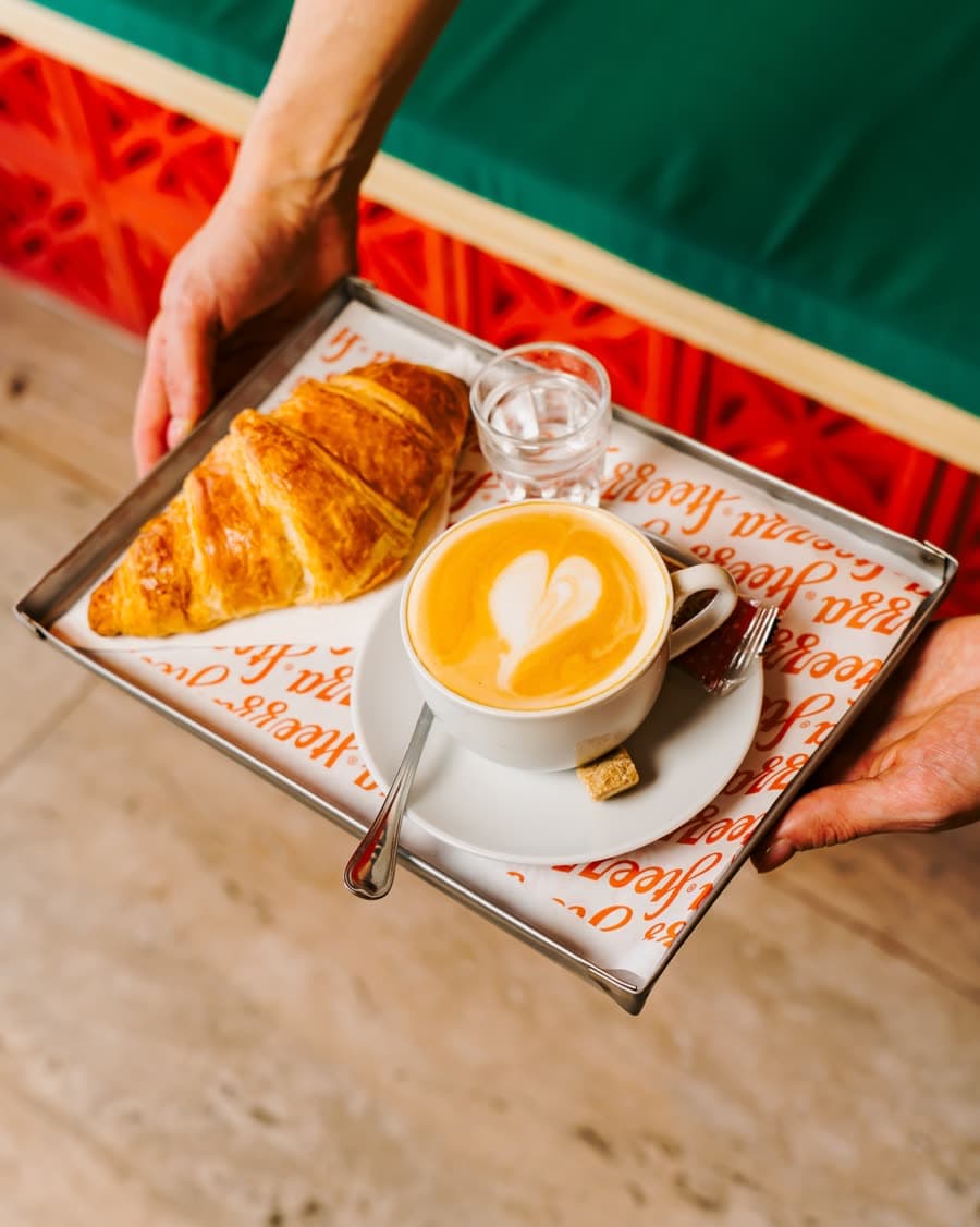 Croissant and cappuccino on Steezza branded paper