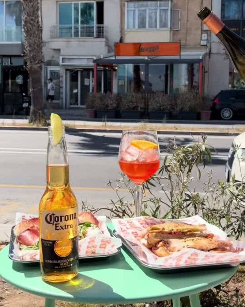 Slices, beer and spritz on the Gżira promenade